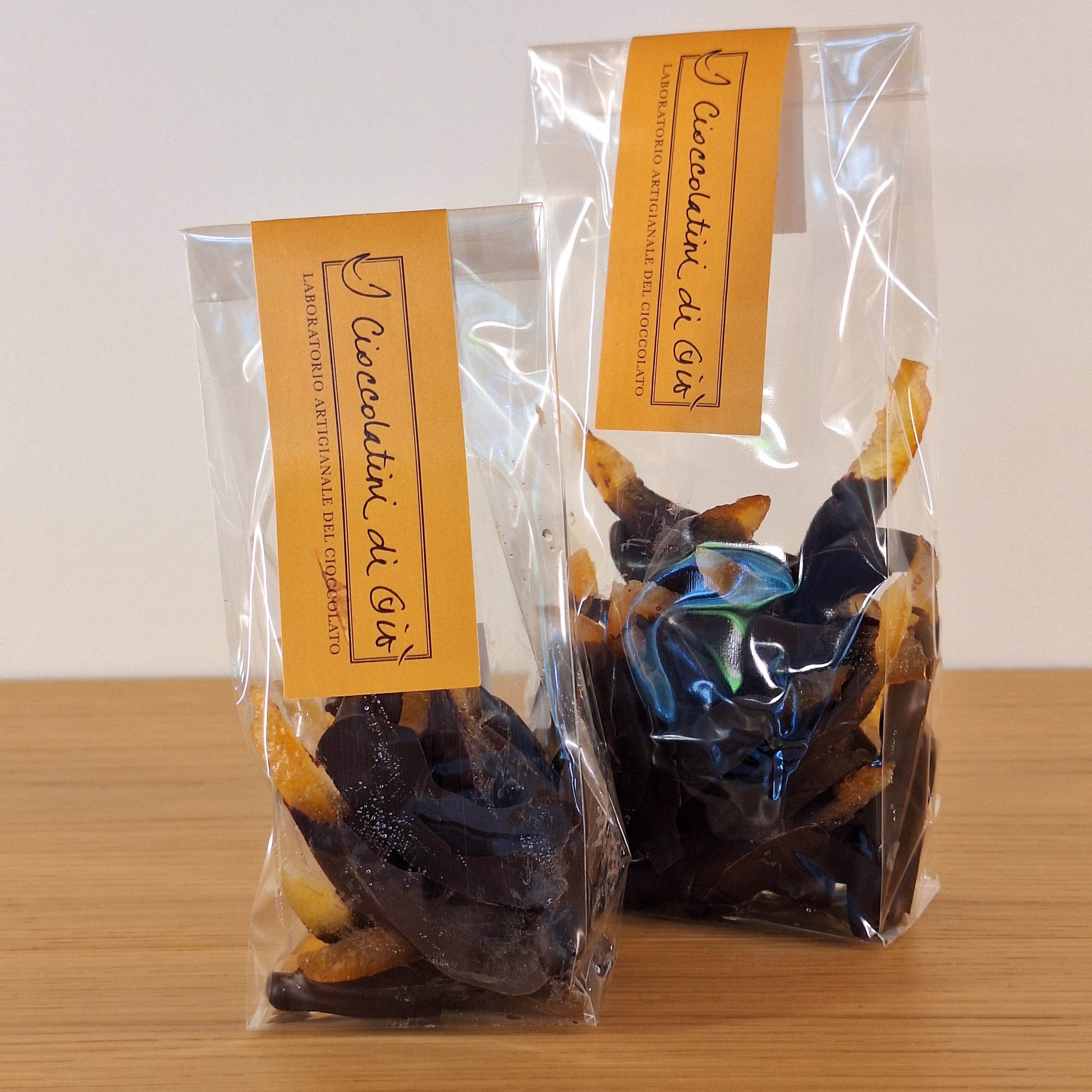 Scorzette d'arancia candita ricoperte di cioccolato Fondente al 65%